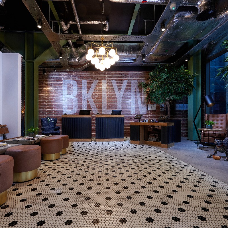 Reception - Wide entrance. Black & white tiled floor & well lit. Tables & seating on left wall. Lowered desk. Induction Loop available. Disabled Toilet to right of reception at approx. 35 paces Personal evacuation plans & Vibrating under pillow alarm available. 2 members of staff use BSL
